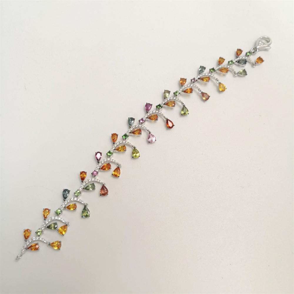 White gold Bracelet with colour gems and cut diamonds