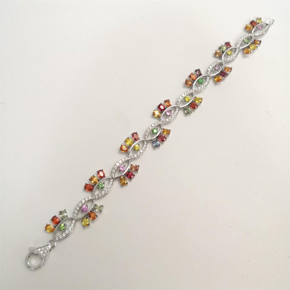 White gold Bracelet with colour gems and cut diamonds