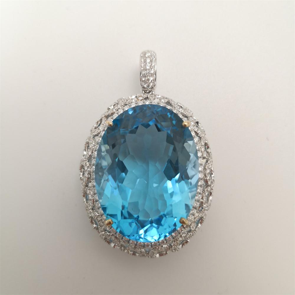 white gold pandent with Aquamarine 59.83cts. and cut diamonds