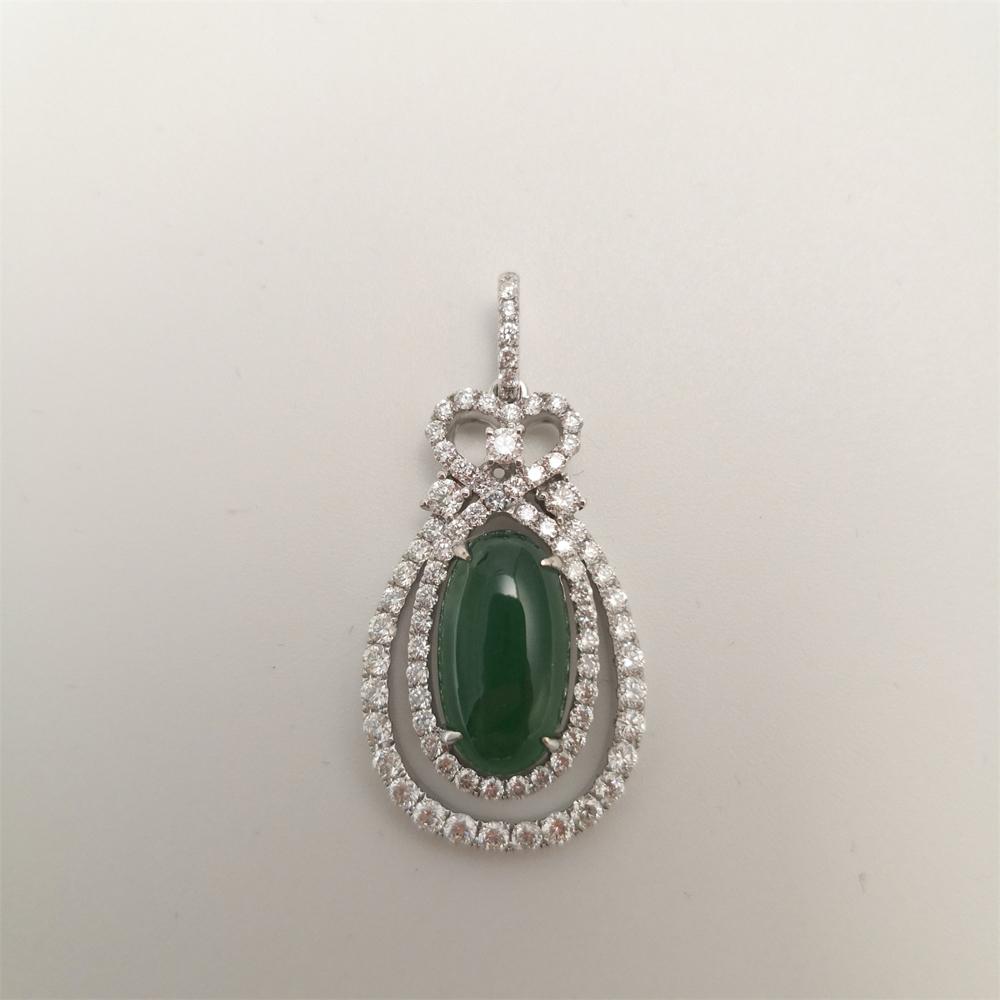 white gold pandent with Jade and cut diamonds