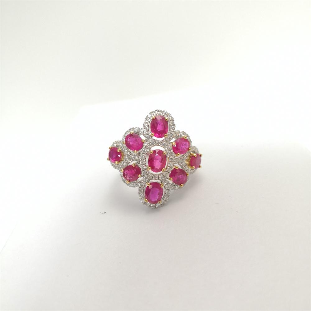 white gold Ring Ruby 9 pieces 3.08cts. and cut diamonds 0.60cts. Gold 7.13g